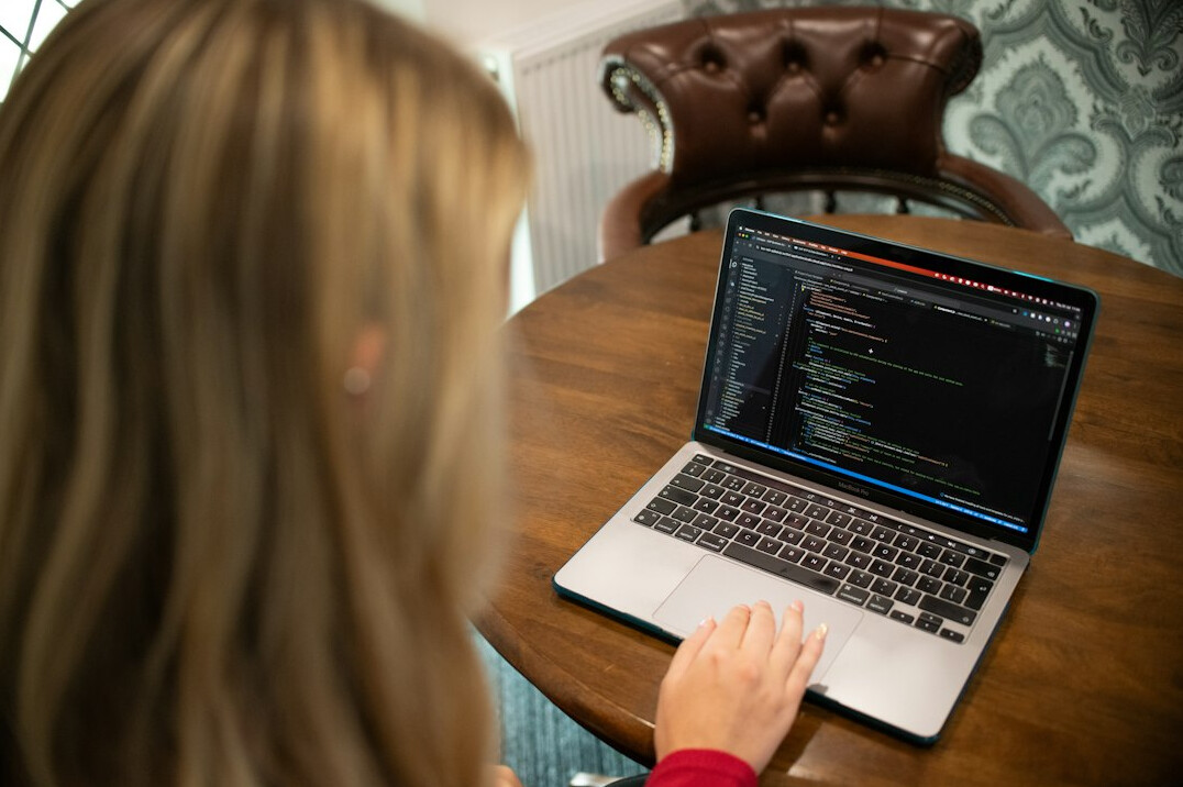 laptop with code editor